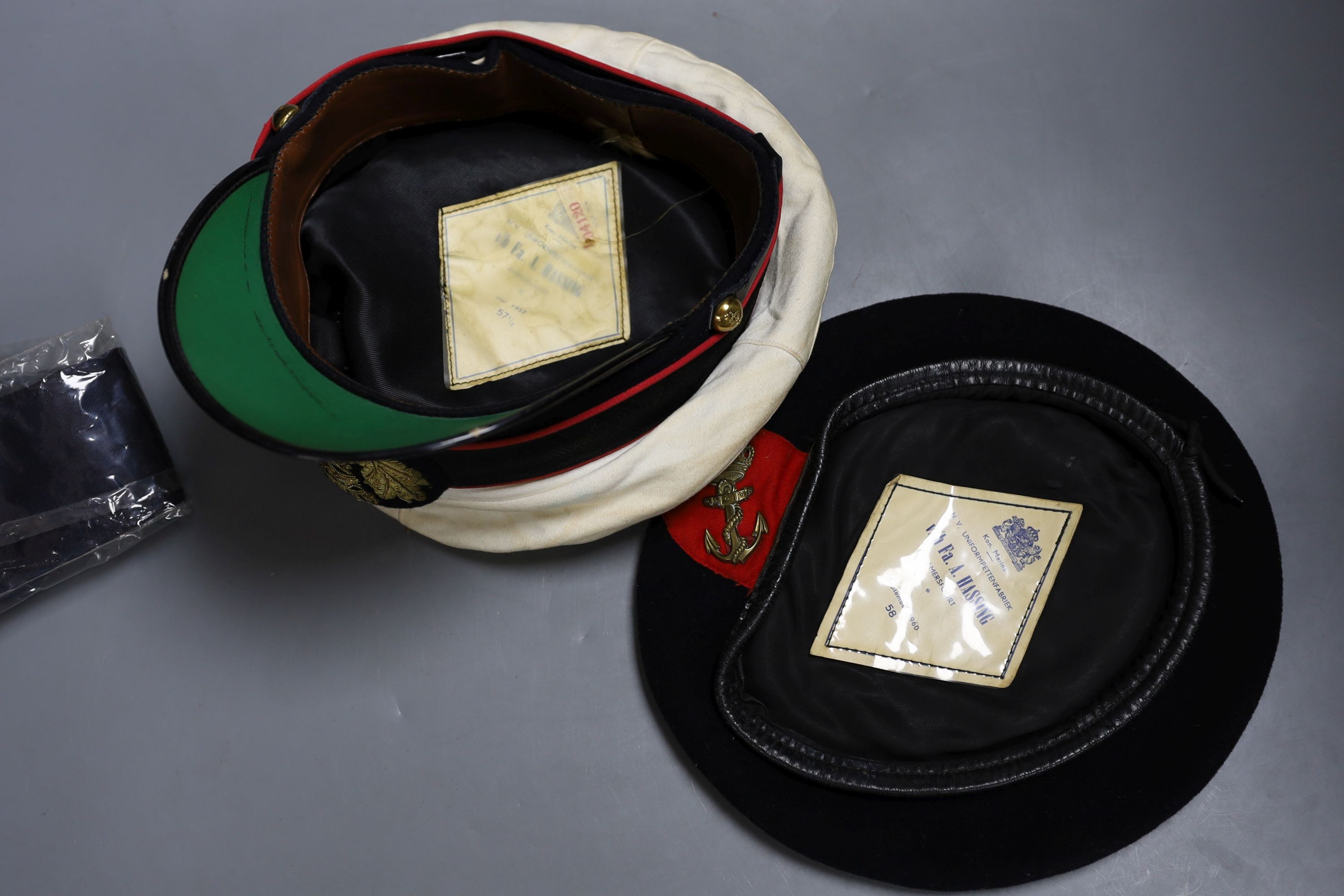 Two military caps and a tie